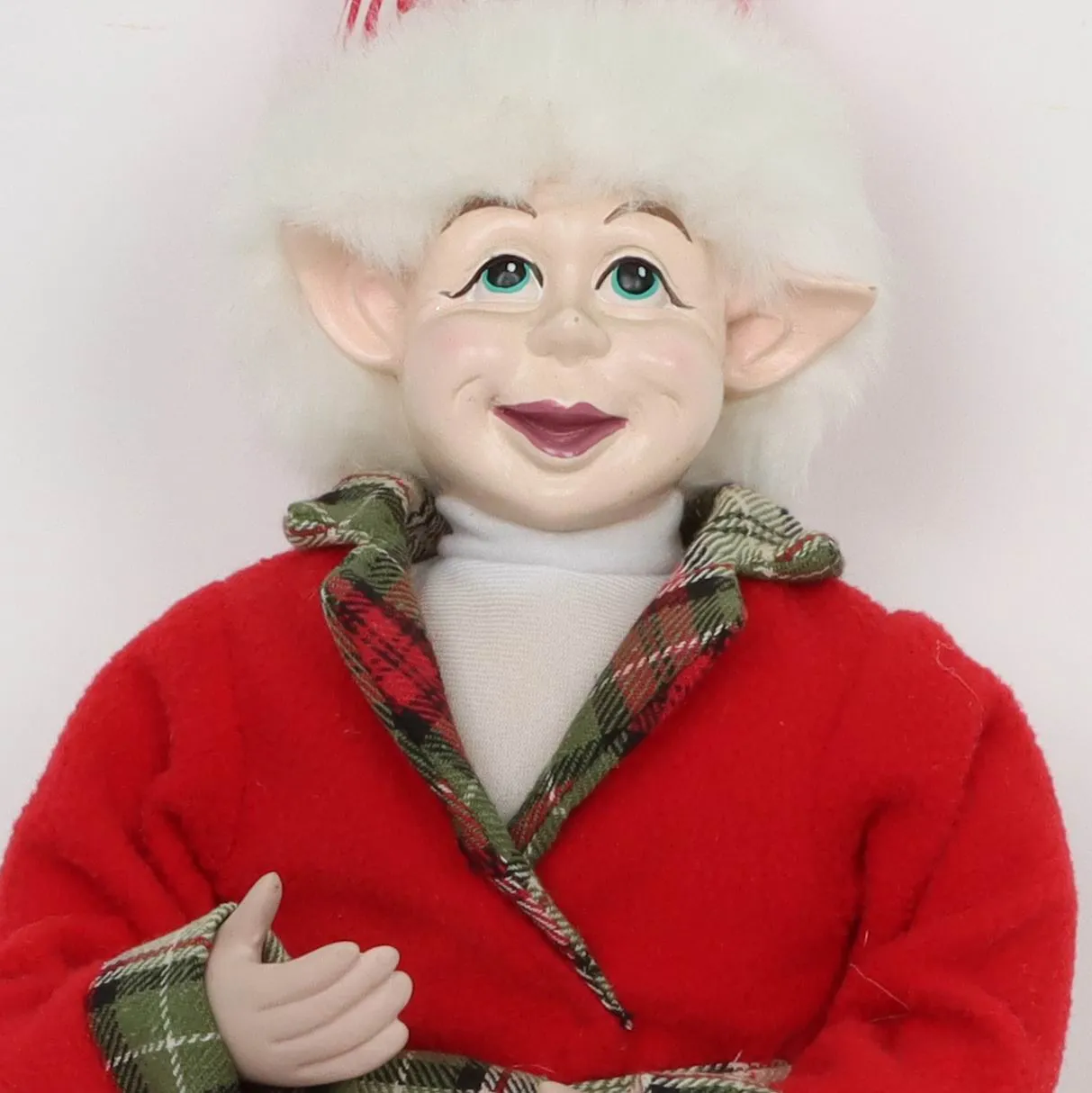 Christmas elf wearing cotton 
pajamas and slippers
