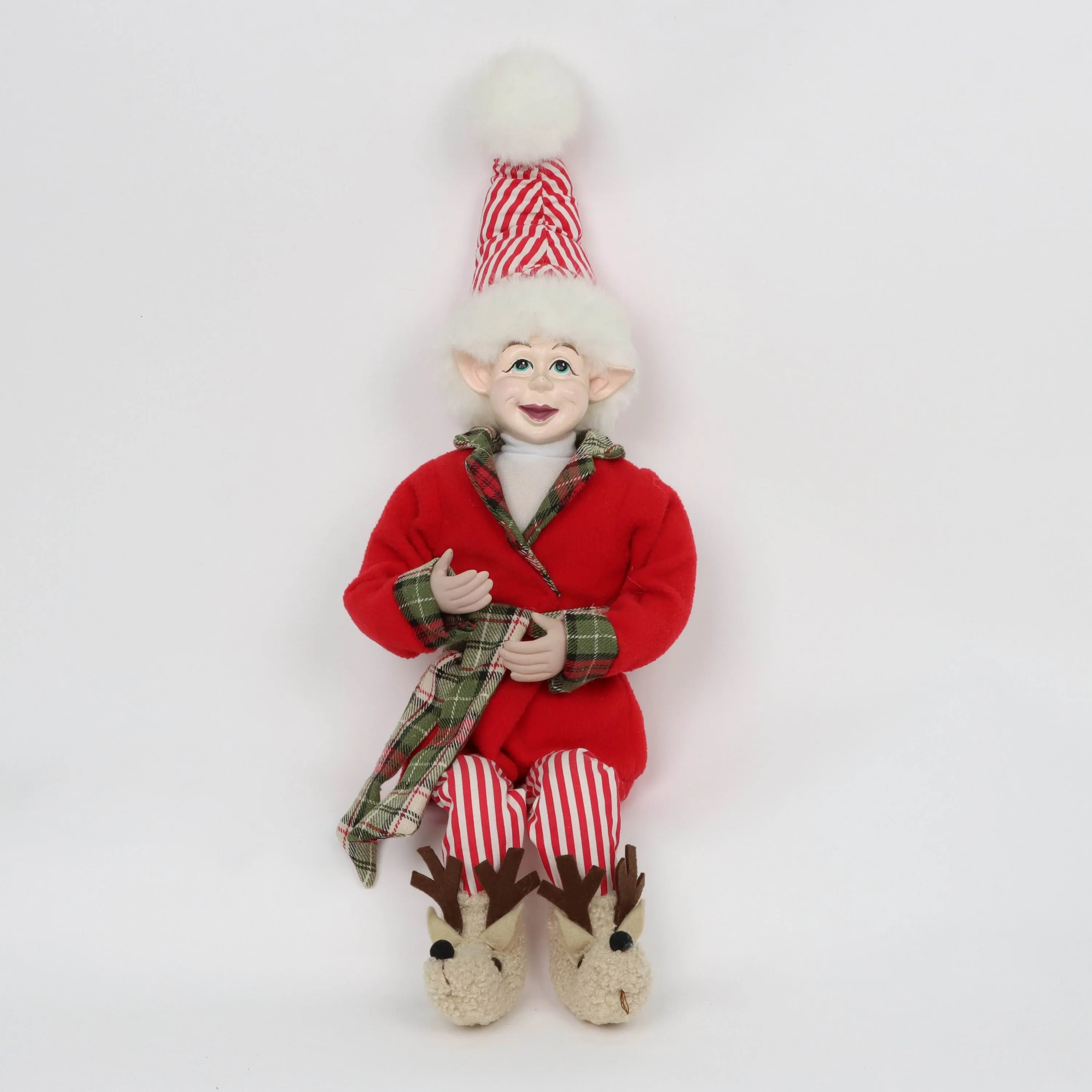 Christmas elf wearing cotton 
pajamas and slippers